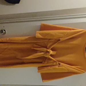 Size 20 mustard Boohoo dress. Never worn.
